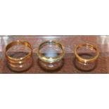 A 22ct gold wedding band, 2.6g; an 18ct gold wedding band, 2.