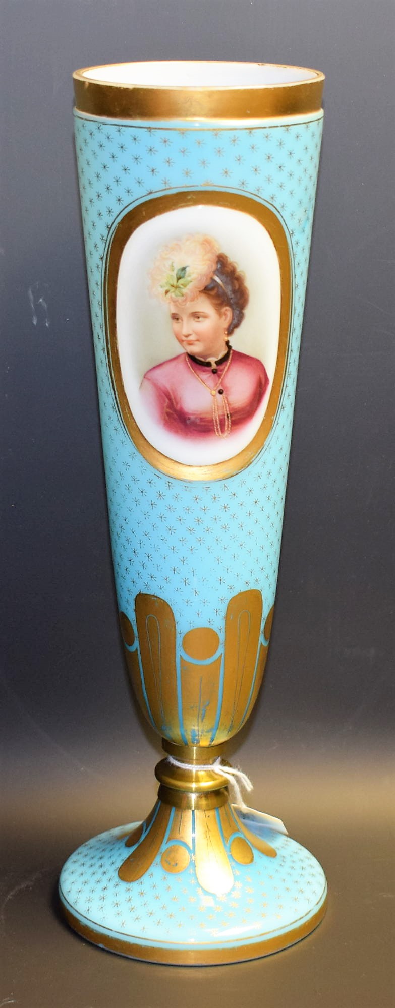 A 19th century pedestal opaque glass vase,