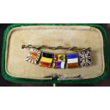 A Sterling silver and enamel brooch, five flags,