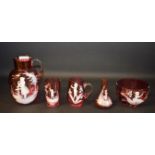 A Mary Gregory cranberry glass jug,