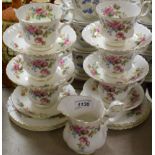 A Royal Albert Moss Rose pattern tea set for six comprising cream jug, side plates,