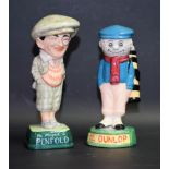 A Royal Doulton ceramic advertising figure, Golfer and Caddie, Dunlop Caddie, MCL2,