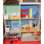 An Ikea two section dolls house with assorted furniture and accessories