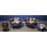 Carnival Glass - a pair of purple lustre Butterflies and Berries bowl, wavy edge,