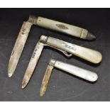A silver and mother of pearl fruit knife; two others,