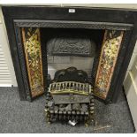 A reproduction Victorian style fire surround, tiger lily tiles to either side,