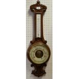 A Victorian oak wheel banjo barometer, porcelain dial, c.