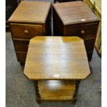 A pair of Homeworthy Furniture mahogany three drawer bedside units; an oak occasional table,