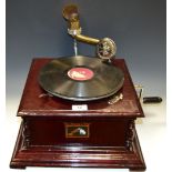 A mid 20th century His Master Voice gramophone, brass and white metal fittings, hand wind action. c.