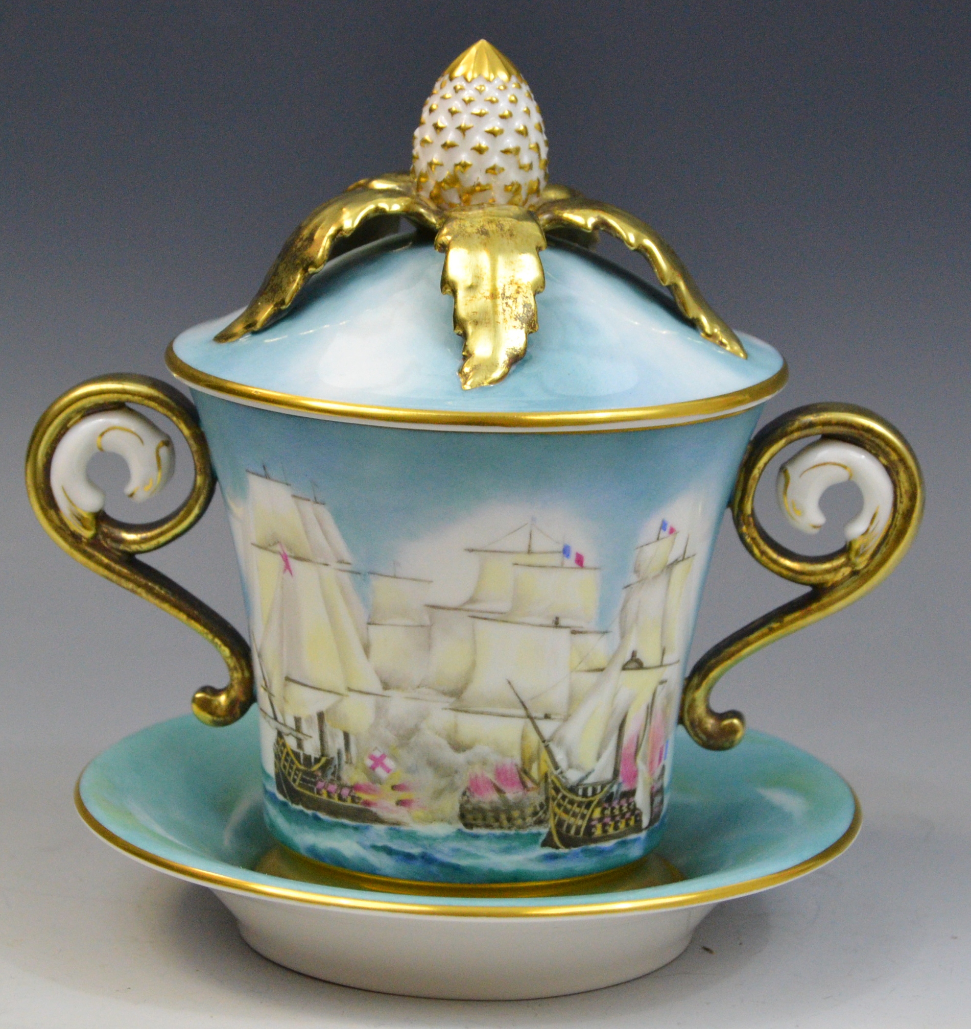 A limited edition Royal Worcester porcelain twin handled cabinet cup, cover and saucer,