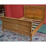 A king size hardwood sleigh bed