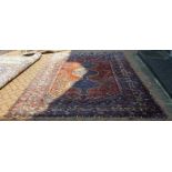 A hand woven antique Persian Qashqai carpet,