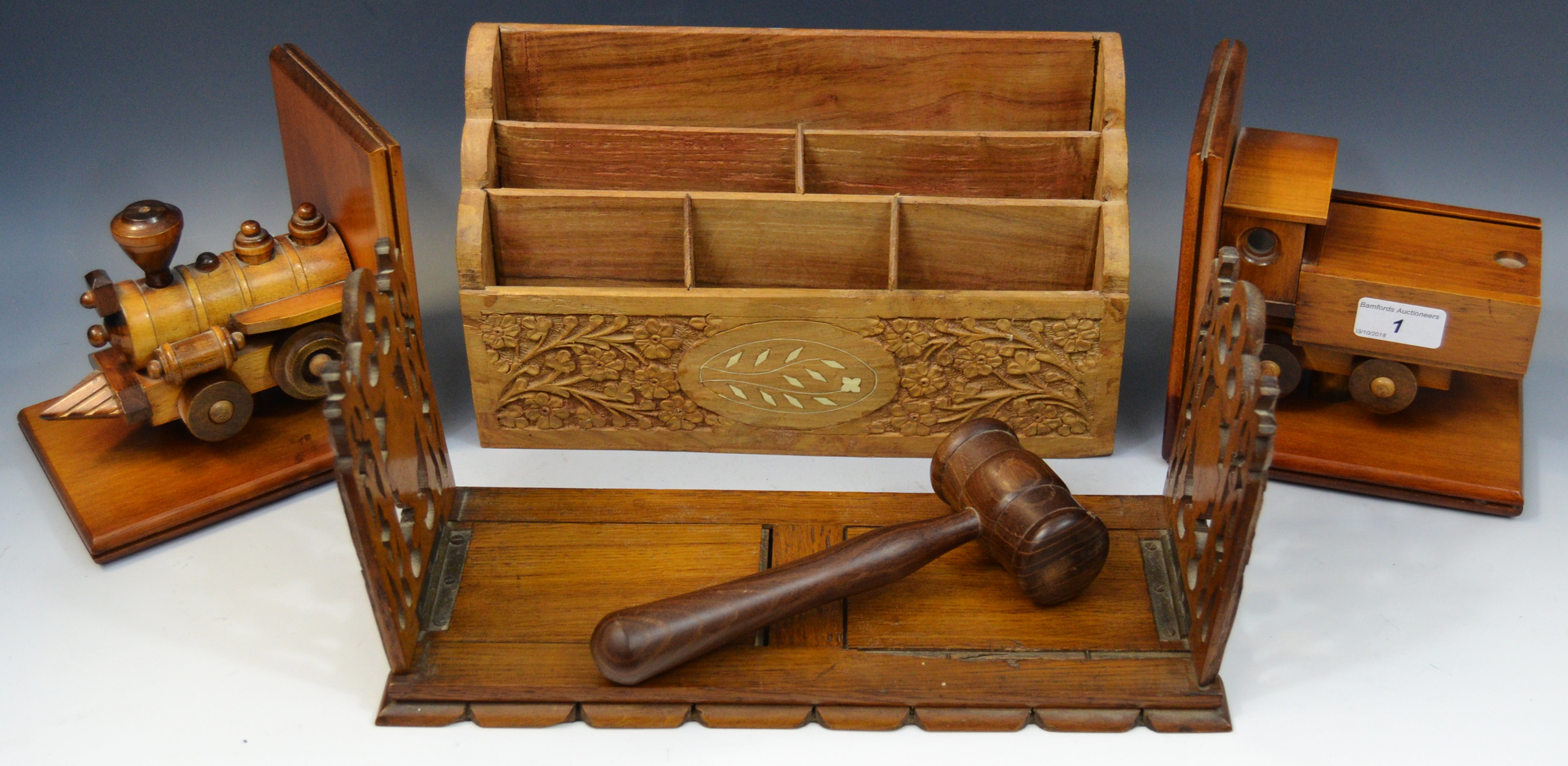 A Victorian oak extendable book rack,