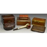 A Victorian leather bound pipe case; a heavily carved folding cigarette case;