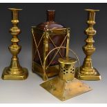 A novelty musical decanter in the form of brass mounted lantern;