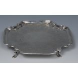 A George II Provincial silver shaped incurved square salver,