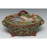 A Minton majolica two-handled game tureen and cover, the cover moulded in relief with hare,