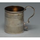 A George III silver cylindrical child's mug, moulded rim above three reeded bands,