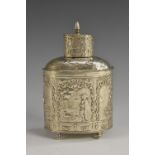 A 19th century Dutch silver oval tea caddy, embossed overall with scenes of pastoral idyll,