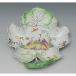 A Longton Hall leaf shaped dish, painted fancy birds and scattered flowers, in relief with leaves,
