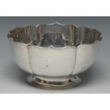 A Chinese silver lotus shaped pedestal bowl, quite plain, spreading circular foot, 17cm diam,