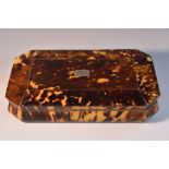 A mid-Victorian tortoiseshell canted rectangular necessaire,