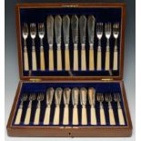 A George V silver fish service, comprising twelve pairs of knives and forks, ivorine hafts,