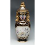 A Mason's Patent Ironstone panelled octagonal vase and cover,