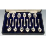 A set of twelve George III silver Beaded Old English pattern teaspoons, bottom struck,