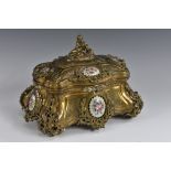 A 19th century French gilt metal and enamelled table box, by Taham, Paris, of bombe serpentine form,