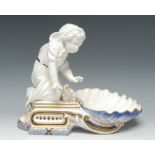 A Copeland figural shell shaped sweetmeat dish, allegorical of Winter,