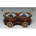 An early 20th century mahogany and electro-plated two-bottle wine trolley coaster, bail handles,