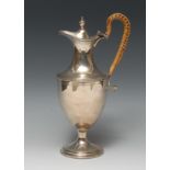 A George III design urnular wine ewer, hinged cover with knop finial, reeded borders,