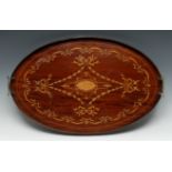 An Edwardian mahogany oval tray, inlaid in coloured woods with batwing paterea,