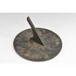 An early 19th century bronze circular sundial, by Cary, London, Roman numerals, shaped gnomon, 17.