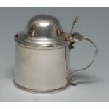 A George III Provincial silver mustard, hinged domed lofty cover, pierced thumbpiece, scroll handle,