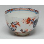 A Lowestoft The Two Birds pattern tea bowl, decorated in under glaze blue,