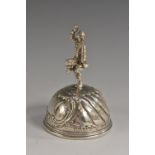 A Continental silver table bell, figural handle, 9cm high,