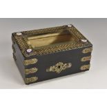 A 19th century French enamel and gilt metal mounted ebonised rectangular bijouterie casket,