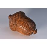 A 19th century coquilla nut novelty nutmeg grater, carved as an acorn,