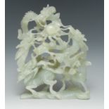 A Chinese green jade group, carved with a Dog of Fo, dragon and deer,