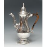 A George III Provincial silver baluster coffee pot, hinged domed lofty cover with knop finial,