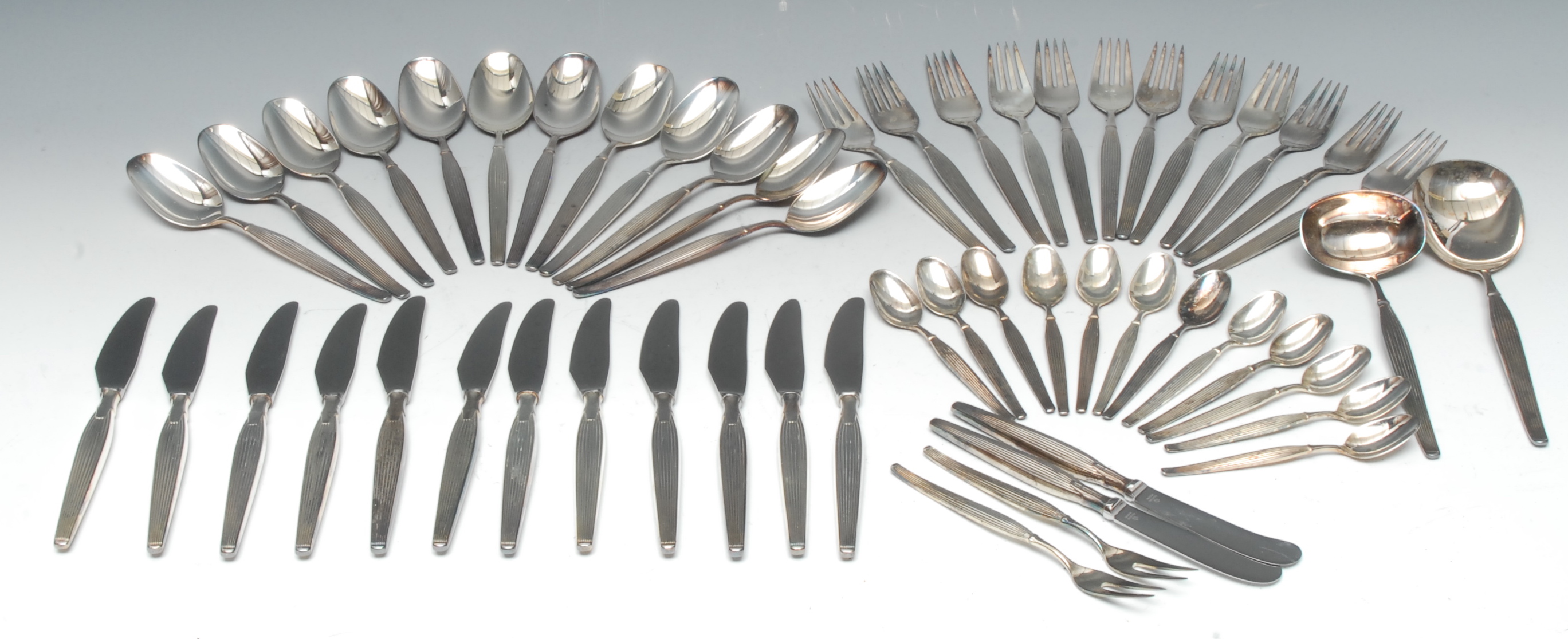 A vintage 1960s silver plated Savoy pattern cutlery set for twelve designed by Henning Seidelin for