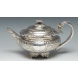 A George III silver bowed teapot, hinged cover, acanthus capped scroll handle, finial and border,