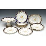 A George Jones Crescent China dessert service, comprising nine shaped circular plates,