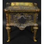 A late 19th century bronzed table casket, as a chest on stand, cast with leaves and foliage,