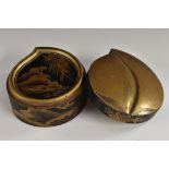 A Japanese black lacquer peach-shaped box, decorated throughout in hiramaki-e and takamaki-e,