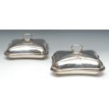 A pair of George III Old Sheffield Plate incurved rectangular entree dishes, loop handles,