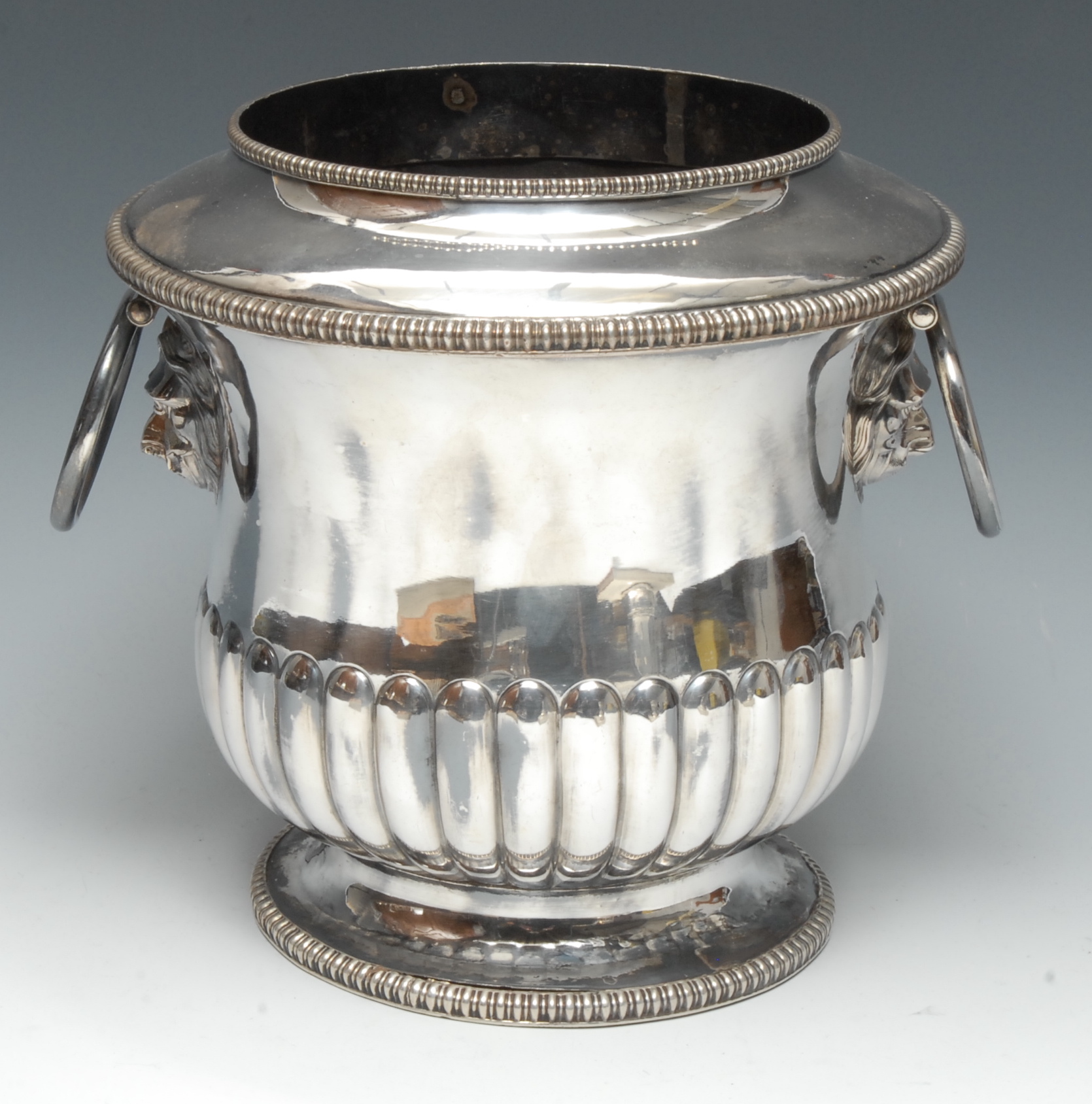 A George III Old Sheffield Plate half-fluted wine cooler, gadrooned borders, detachable liner,