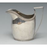 A 19th century Dutch silver oval helmet shaped cream jug, quite plain, beaded borders,